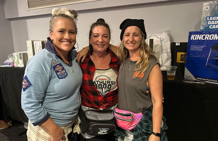 Silent auction legends Shannon Collins, Jane Keegan and Abby Eakin rocking their Bogan gear.