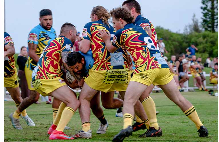 Trever Campbell, Tom Bray and Luke Wilson wrap up the opposition. Photo: Kim Ambrose/SaltyFoxFotography.
