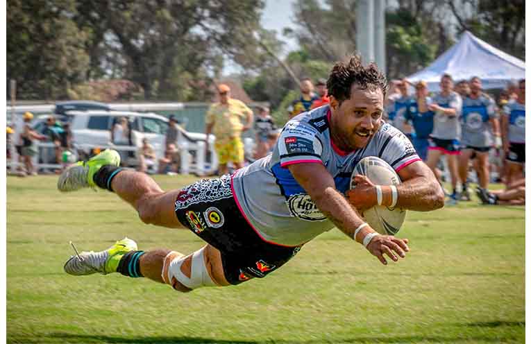 Warren Buchanan crossing the line. Photo: Kim Ambrose/SaltyFoxFotography.