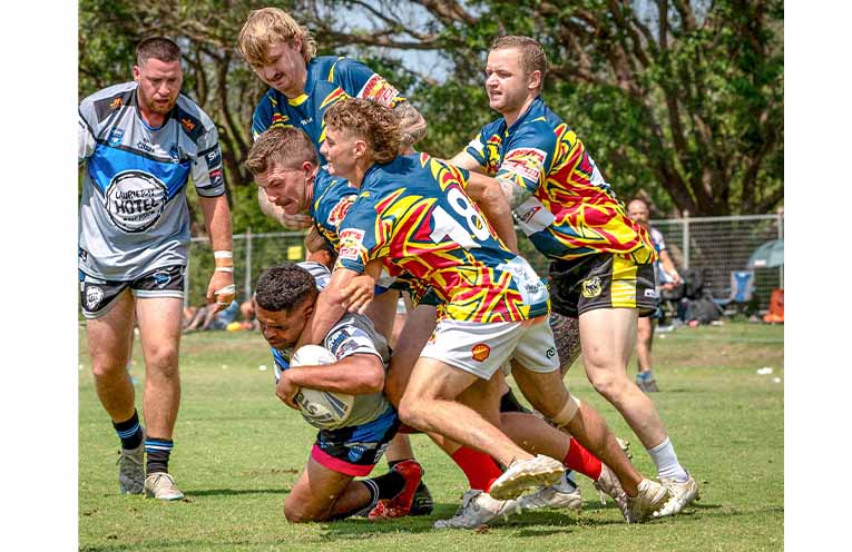 Luke White crashing across the line. Photo: Kim Ambrose/SaltyFoxFotography.