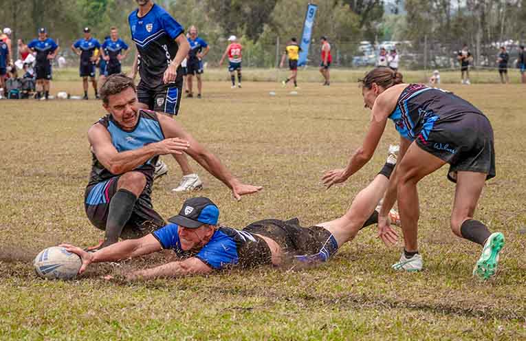 Steve Roberts crossing the line. Photo: Kim Ambrose/SaltyFoxFotography.