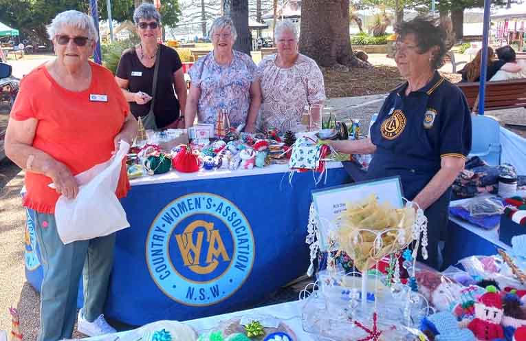 CWA members setting up for the Christmas Fair, Jan Coffey, Jennifer Martin, Lyn Armstrong, President Jill Adams and Fern MacLachlan. Photo: Pauline Cain.