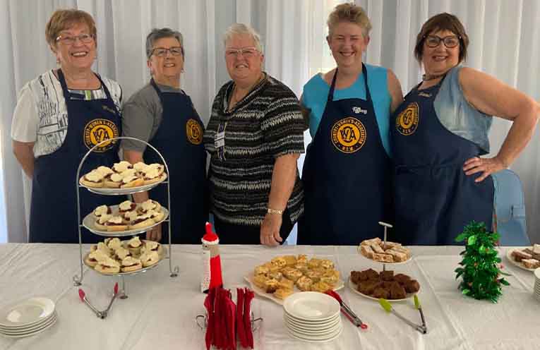 Keeping up the Christmas spirit, Wendy Evans, Helen Hewens, President Jill Adams, Tiffany Brooks and Janis Miles. Photo: Pauline Cain.