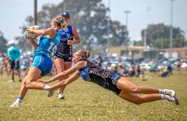 Darcie Gleeson, co-captain of the W20s, stopping the opposition. Photo: Kim Ambrose/SaltyFoxFotography.