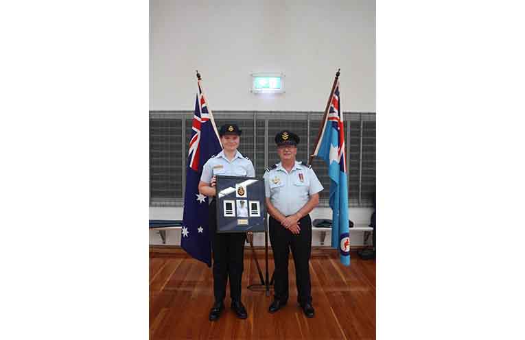 Commanding Officer Chris Gibbs awards and farewells CUO Grace Adlington, as she turned 18 and is bound for adulthood. Photo: supplied.