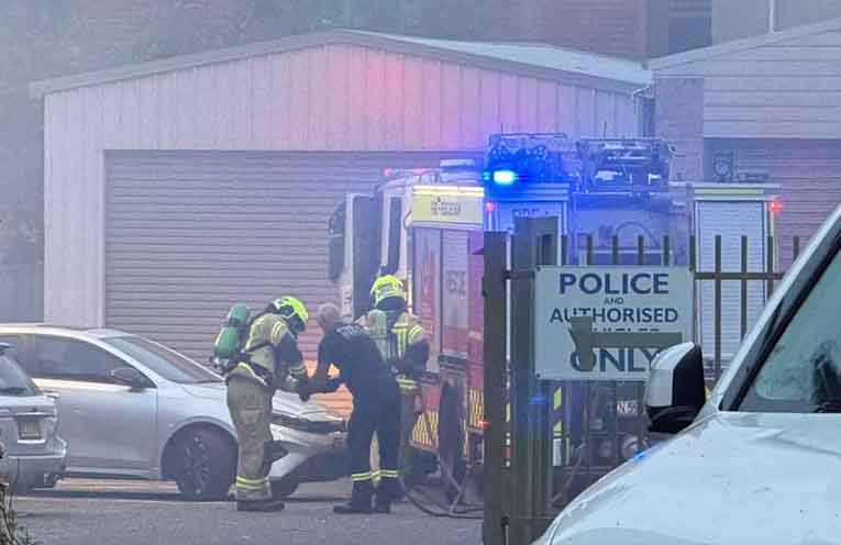 Fire crews in the secure parking lot behind the Port Macquarie Police Station. Photo: Port Macquarie On Scene.