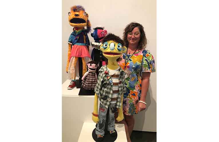 Bridget Purtill, The Glasshouse Gallery Curator, with Finn Channells’ collection of works, ‘One and the same.’ Photo: Pauline Cain.