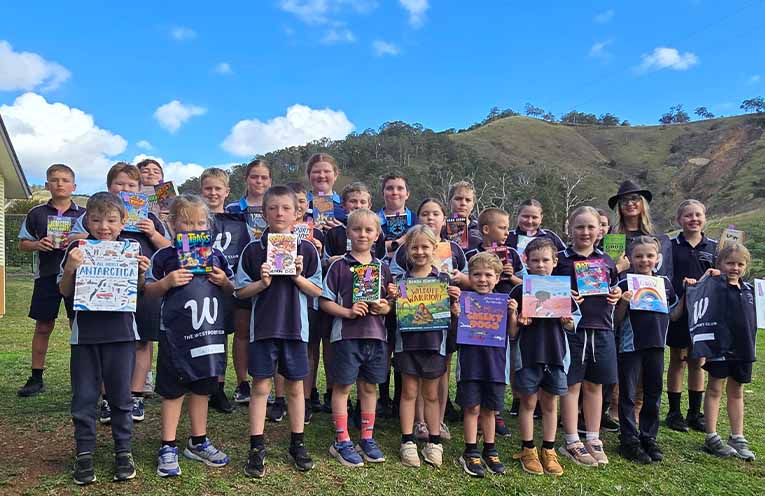 Long Flat Primary School students after receiving their books.