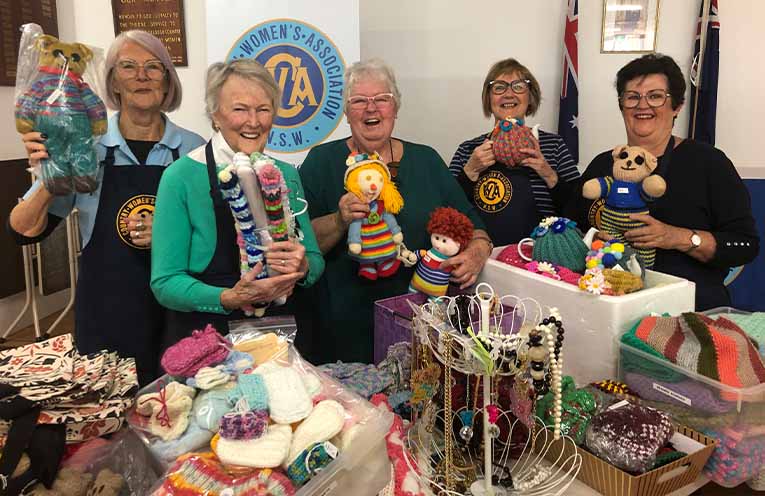 CWA members Ann, Robyn, Jill, Janis and Helena setting up their ArtWalk market stall.