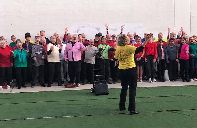 “Here Comes the Sun” launches ArtWalk with a mass community choir gathered for The Big Sing. Photo: Pauline Cain
