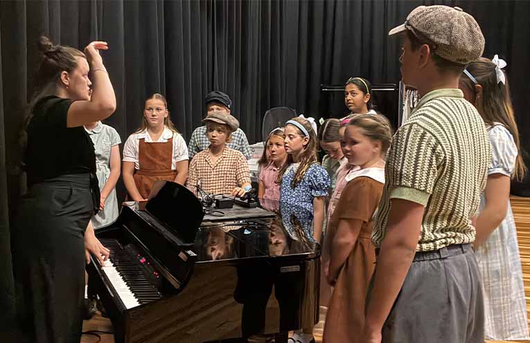 Stephanie Arnold, Opera Australia Chorus Master, leading the children in rehearsal the day prior to the performance. Photos: Supplied.