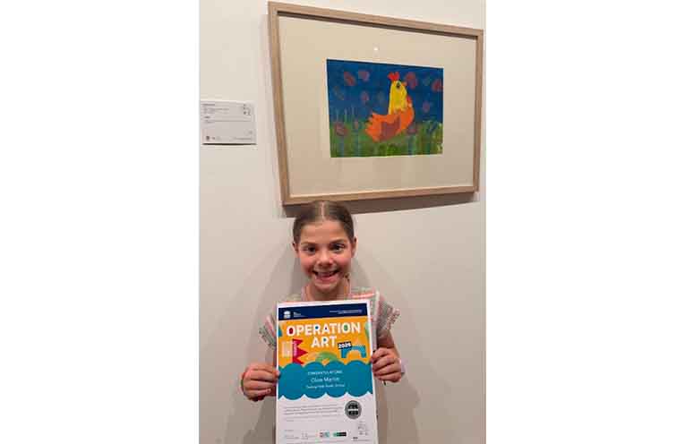Year 2 Tacking Point Public School student Olive Martin with her artwork, “Peggy”. Photo: Pauline Cain