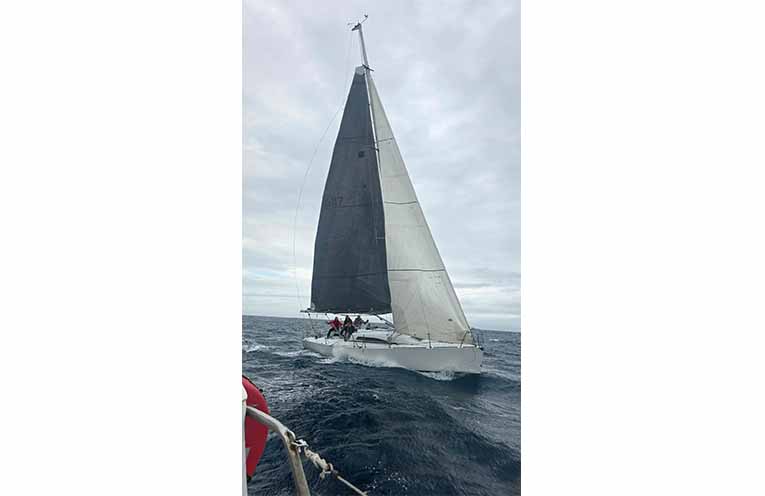 Enticer reefed down in heavy offshore winds. Photo: Supplied.